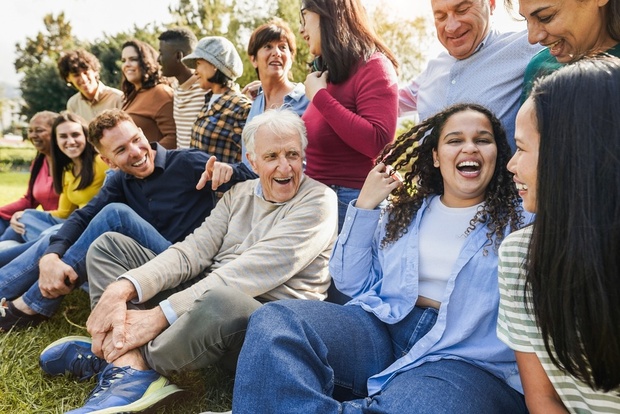 A multigenerational, diverse group of friends